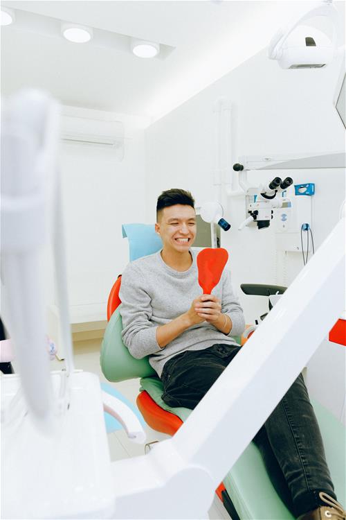 man-sitting-on-dental-chair-3845808